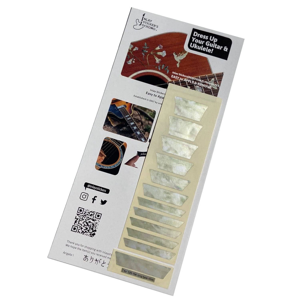 Inlay sticker sheet in retail package with pale rectangular fretboard markers