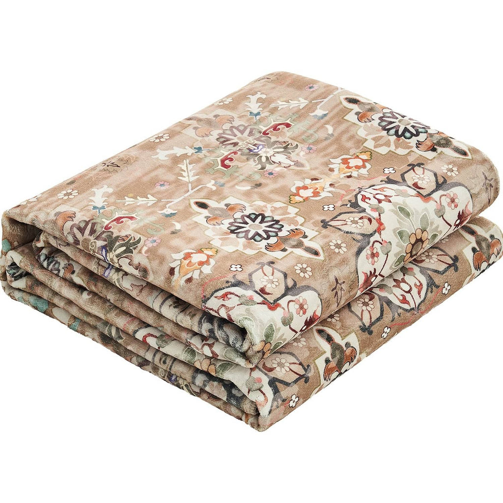 Large area rug, vintage floral pattern in beige, brown, and green, folded stack