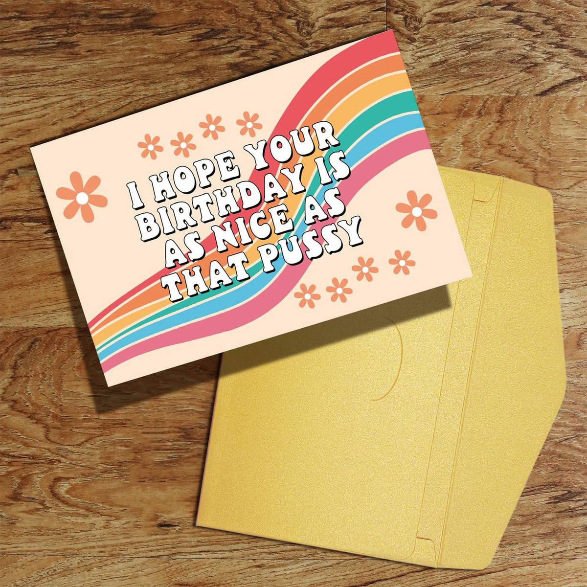 Funny birthday card with rainbow; text reads “I hope your birthday is as nice as that pussy”