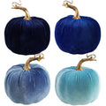 Set of four blue faux velvet pumpkins with gold stems and hanging loops, assorted shades