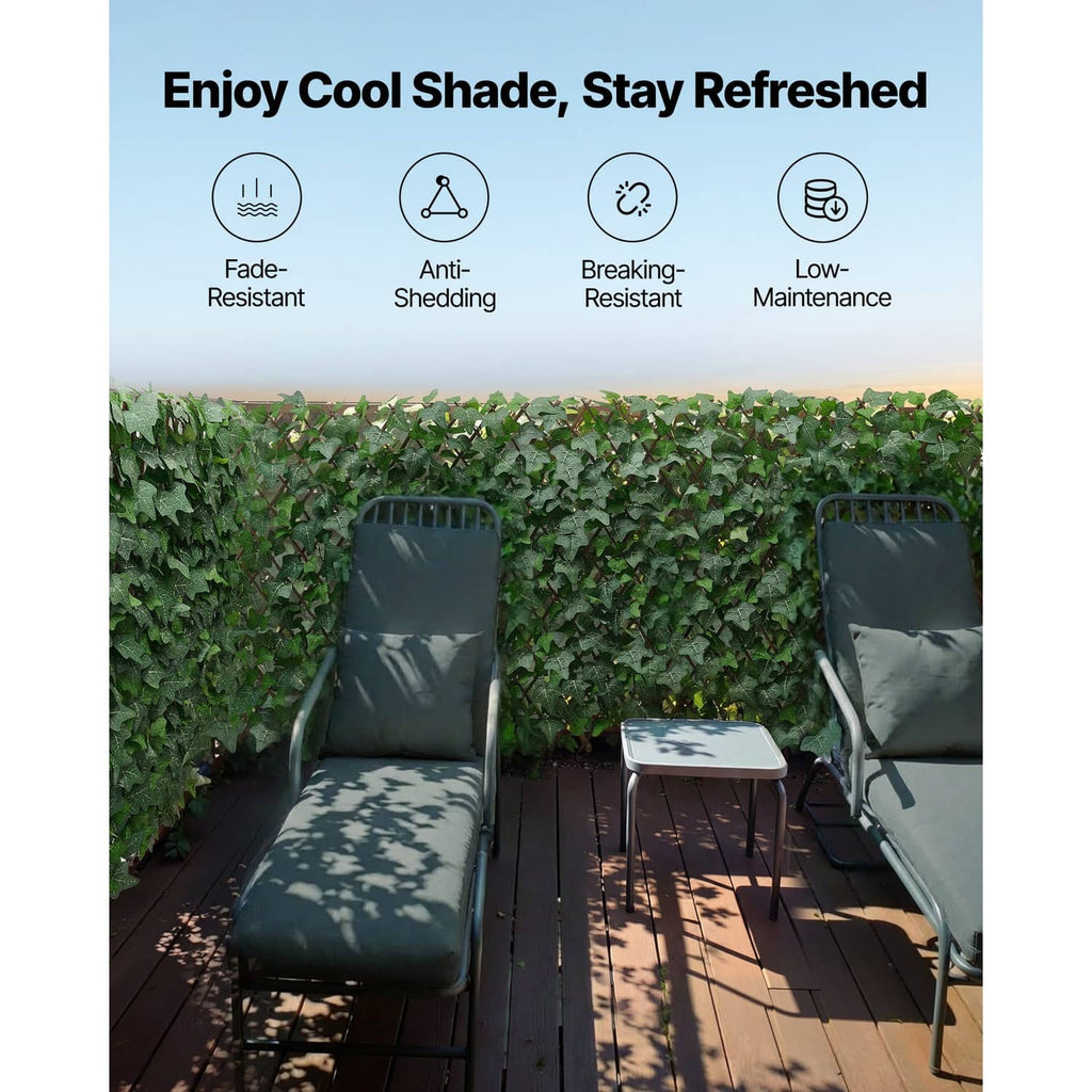 Artificial privacy screen wall with dense green faux ivy leaves for outdoor privacy