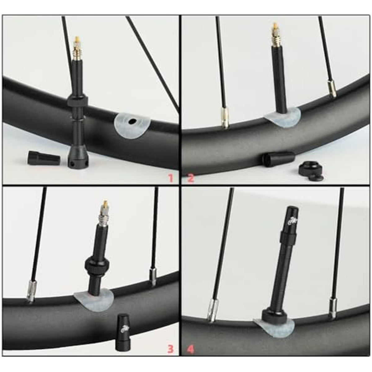 Presta bicycle valve stem installed in bike rim, with black stem and cap