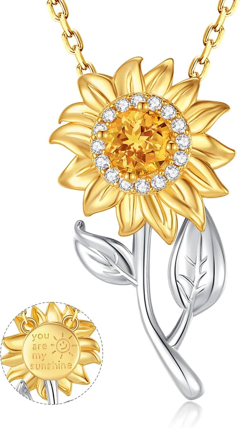 Gold-tone sunflower pendant with clear stones and silver spinning leaf on chain