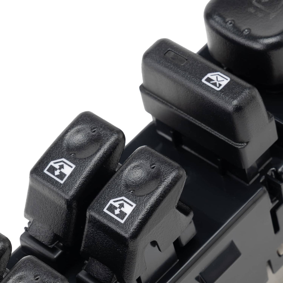 Close-up of power window switch rockers with up/down icons, black plastic.