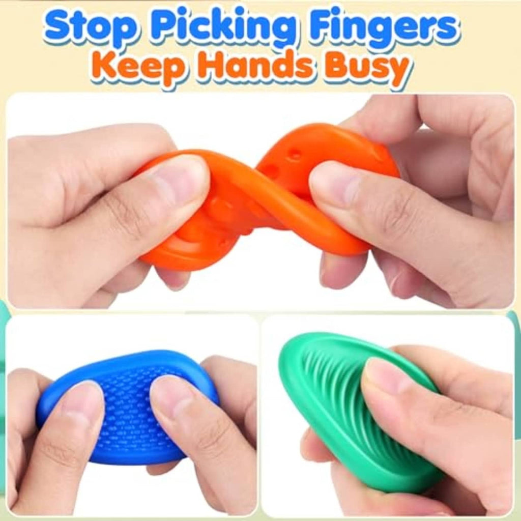 Hands using orange and blue sensory worry stones with textured grips for fidgeting