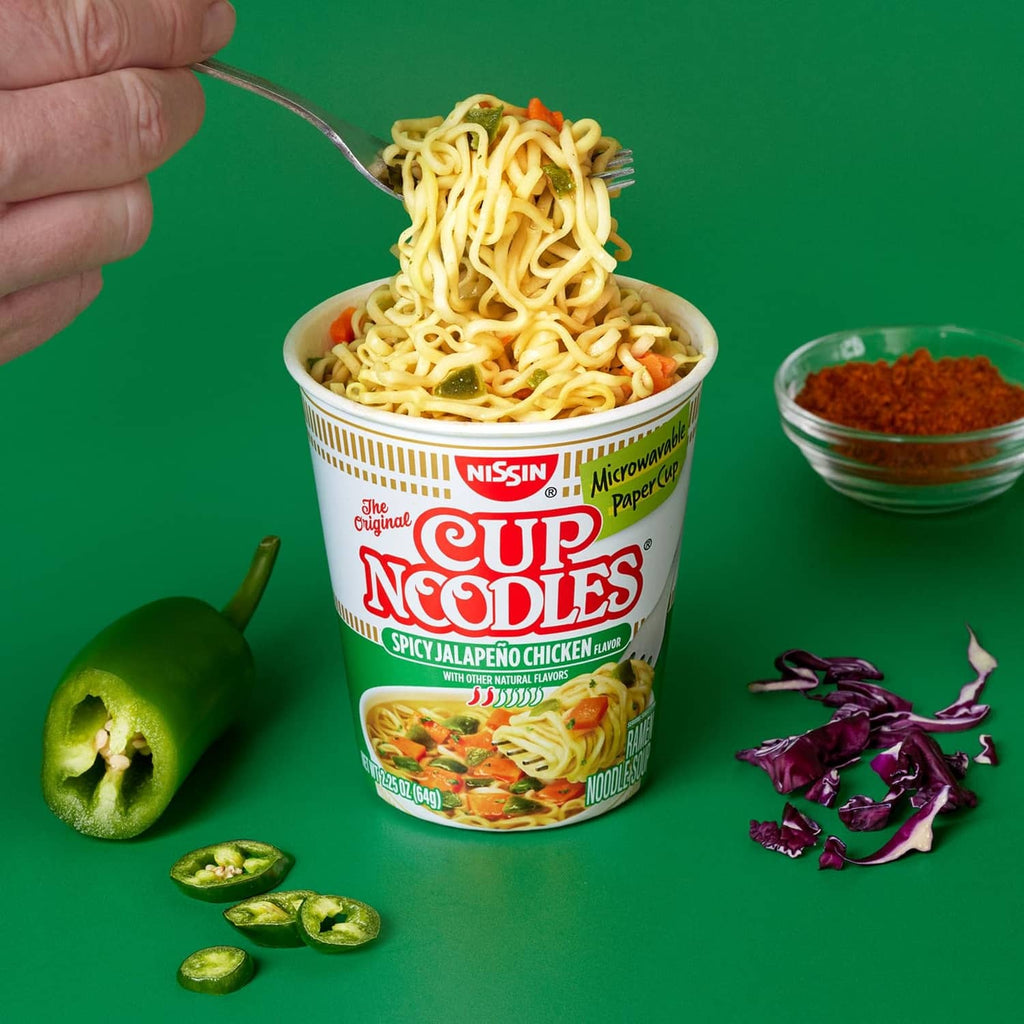 Spicy jalapeno chicken Cup Noodles cup with jalapeno slices and seasoning