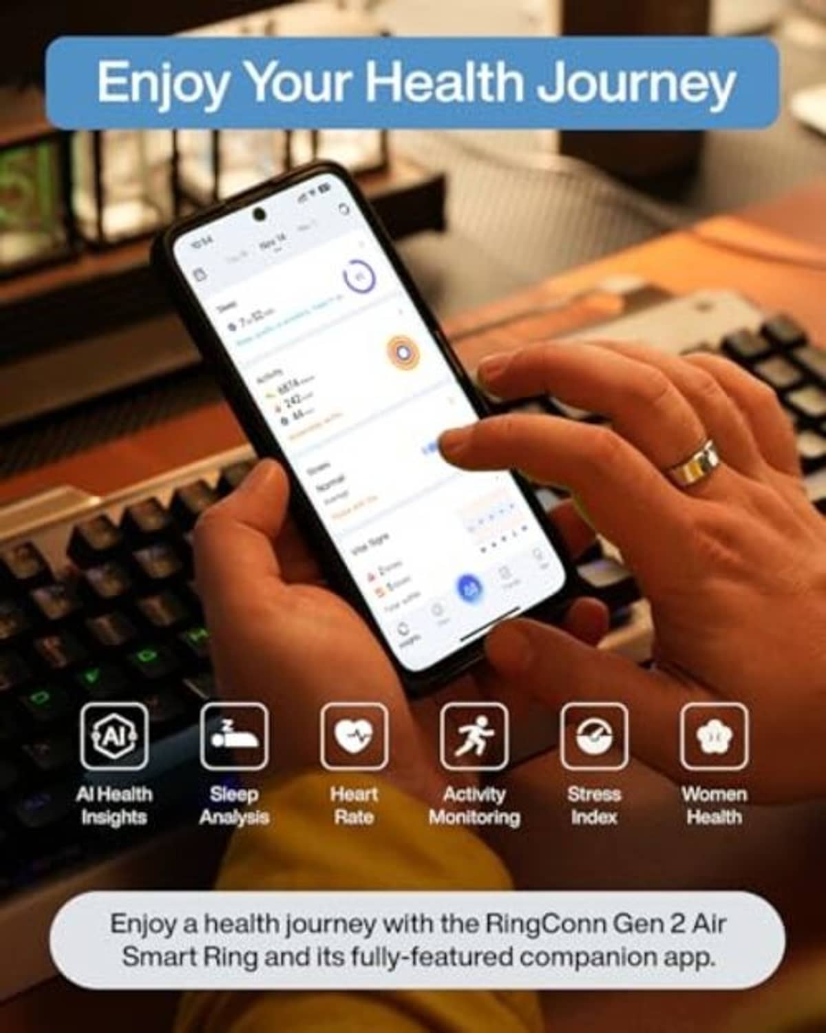 Silver smart ring on fingers beside smartphone health app screen