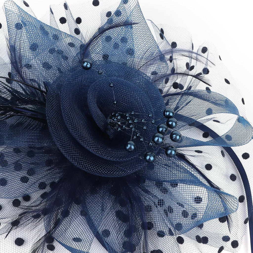 Navy polka-dot tulle fascinator flower with bead and feather detail