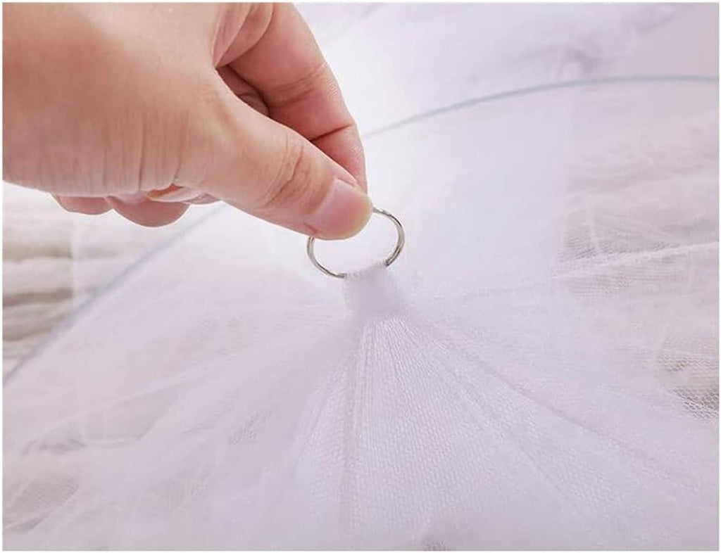Pink sheer canopy mosquito net close-up with fastening ring