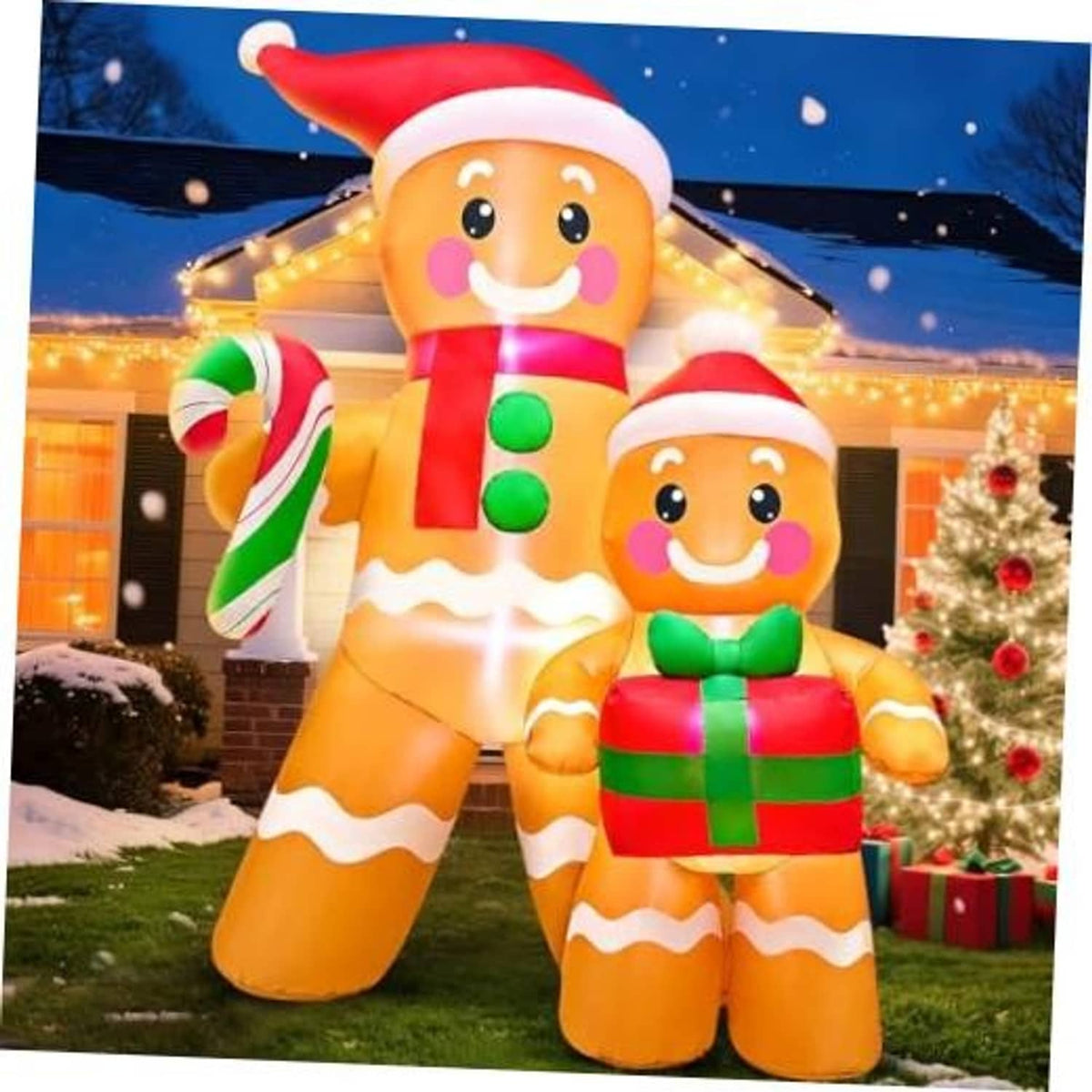 Outdoor inflatable gingerbread figures, one holding candy cane and one holding a green gift
