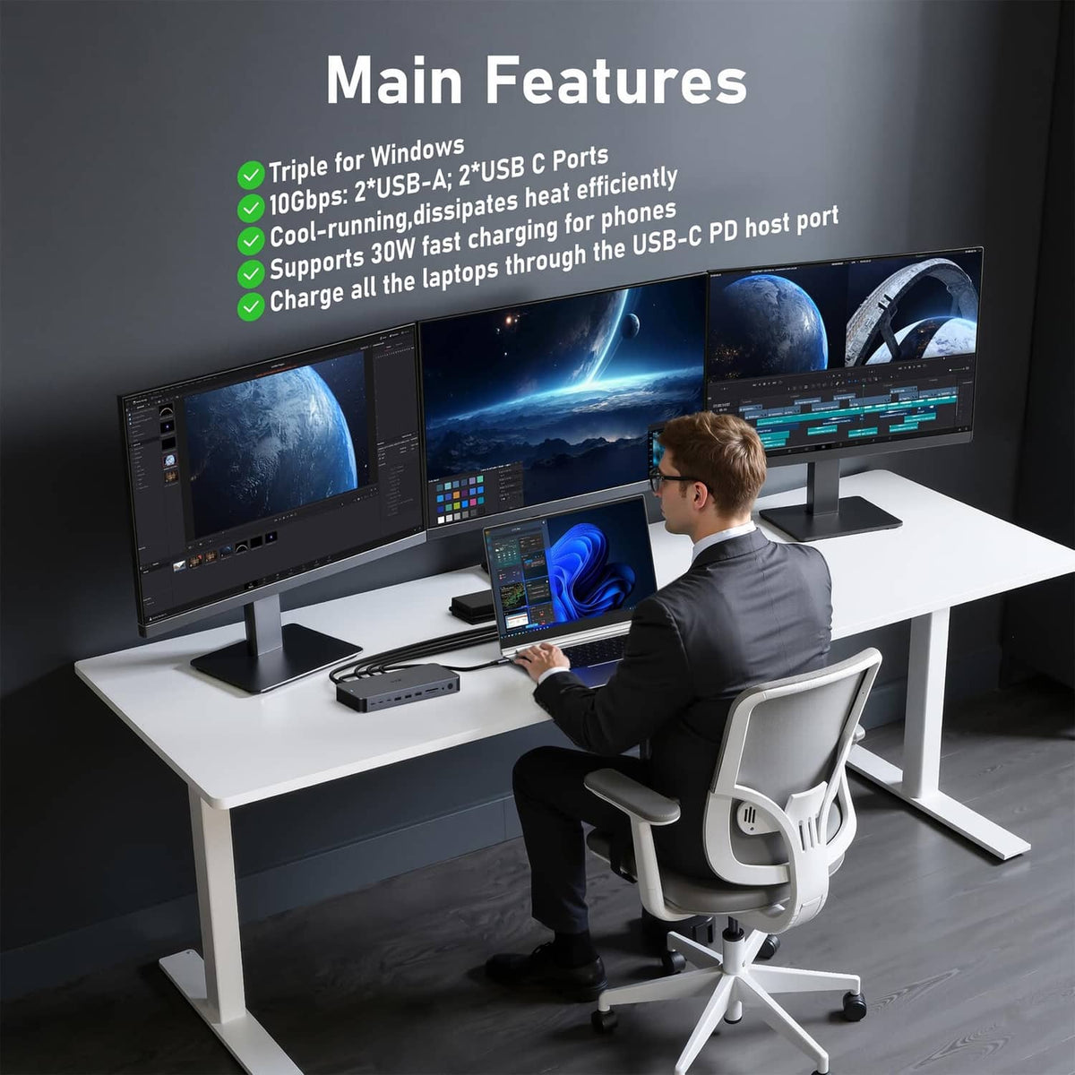 Space gray laptop docking station on desk with multiple connected cables