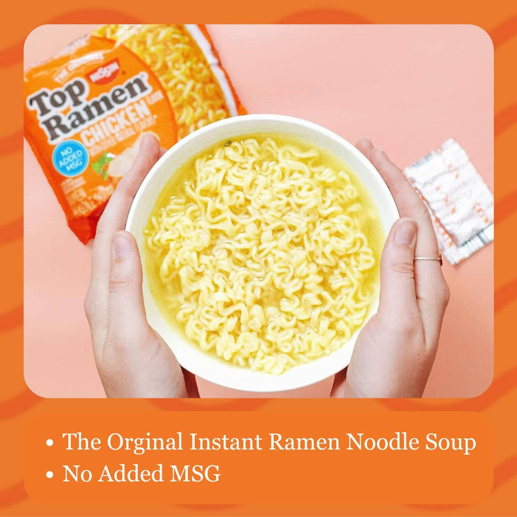 Top Ramen chicken noodle soup bowl held by hands with orange packet