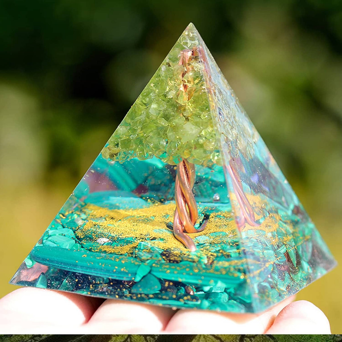 Teal and green pyramid resin casting with copper hook, in a clear mold shape