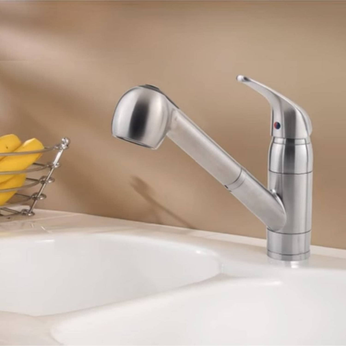 Stainless steel 1-handle kitchen faucet over sink basin with smooth spout