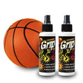 Performance Grip shoe sole spray bottles with black pump cap, shown with orange basketball