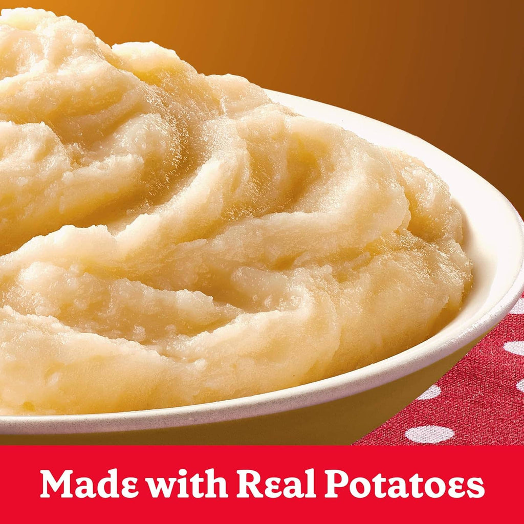 Creamy mashed potatoes in a bowl with a smooth, swirled texture