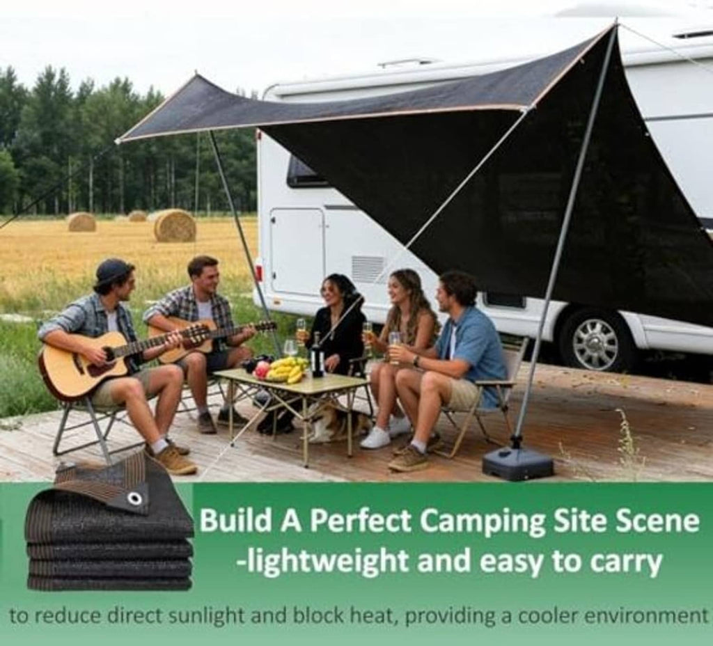 Black shade sail canopy stretched outdoors with triangular shape and corner grommets