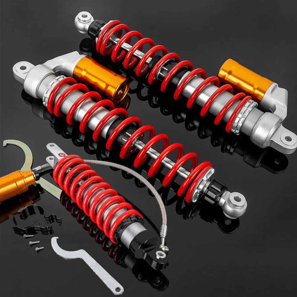 Four air shock absorbers with red coil springs, orange reservoirs, silver hardware