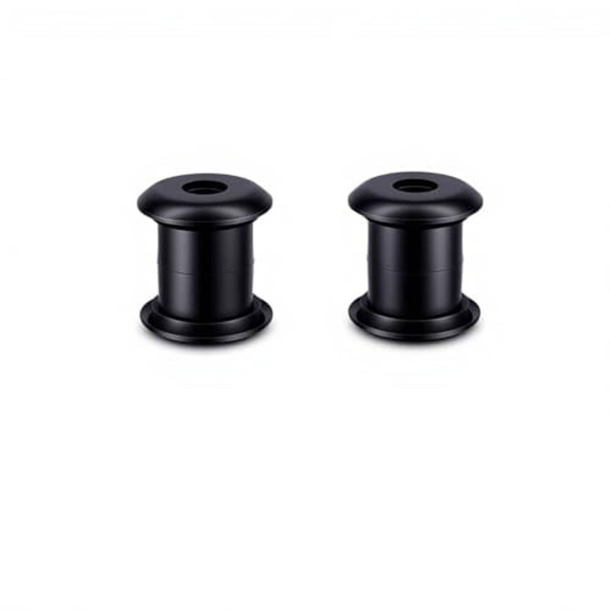 Pair of black polyurethane handlebar riser bushings with center mounting holes