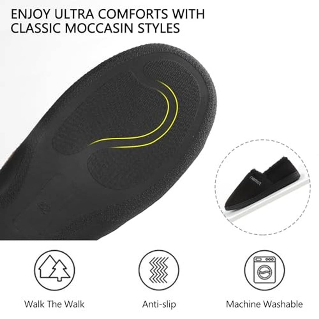 Black moccasin slippers showing textured anti-slip tread on the sole.