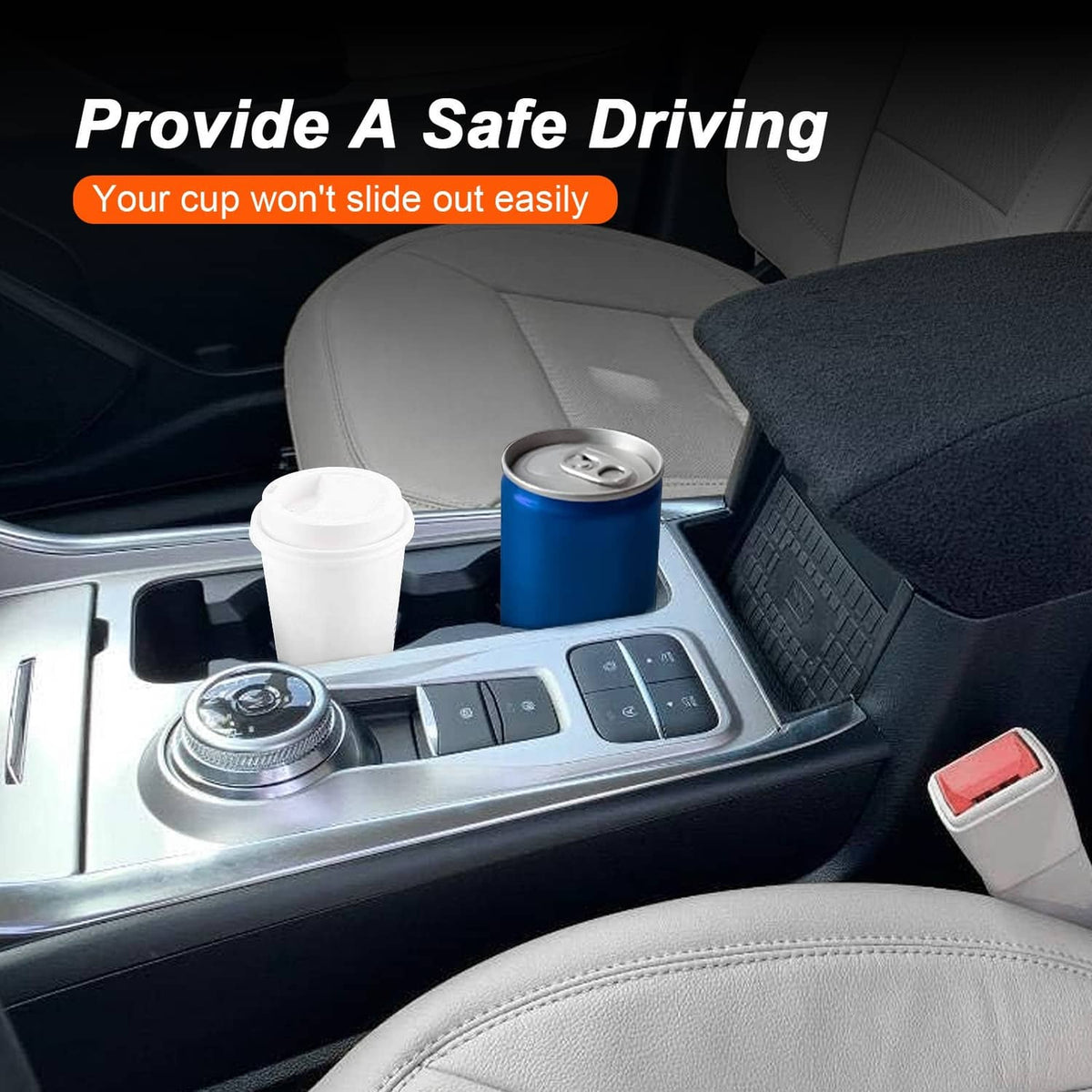Center console cup holder with two drink slots holding a white cup and a blue can