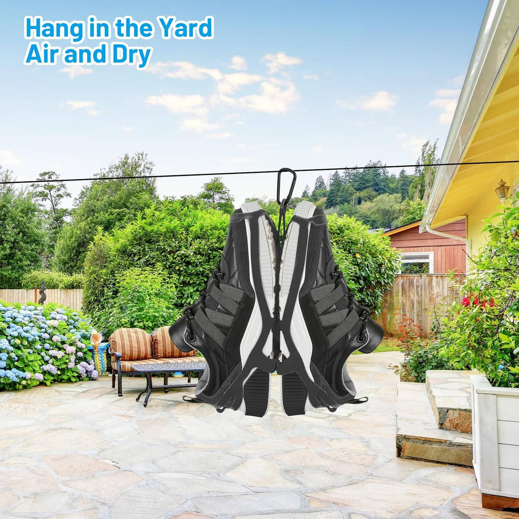 Black shoe holster hanging outdoors with two separate compartments