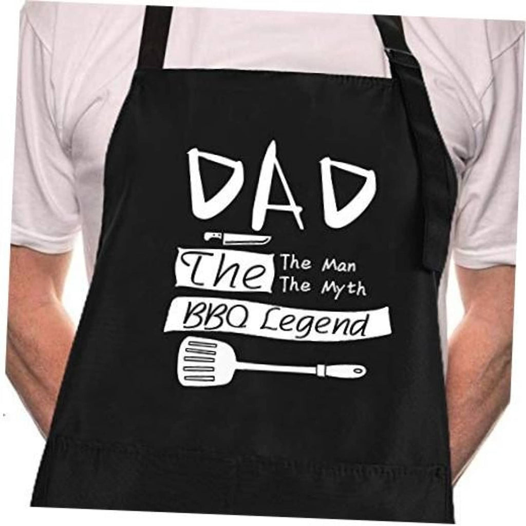 Black chef apron with 'DAD The Man The Myth BBQ Legend' graphic and long waist ties