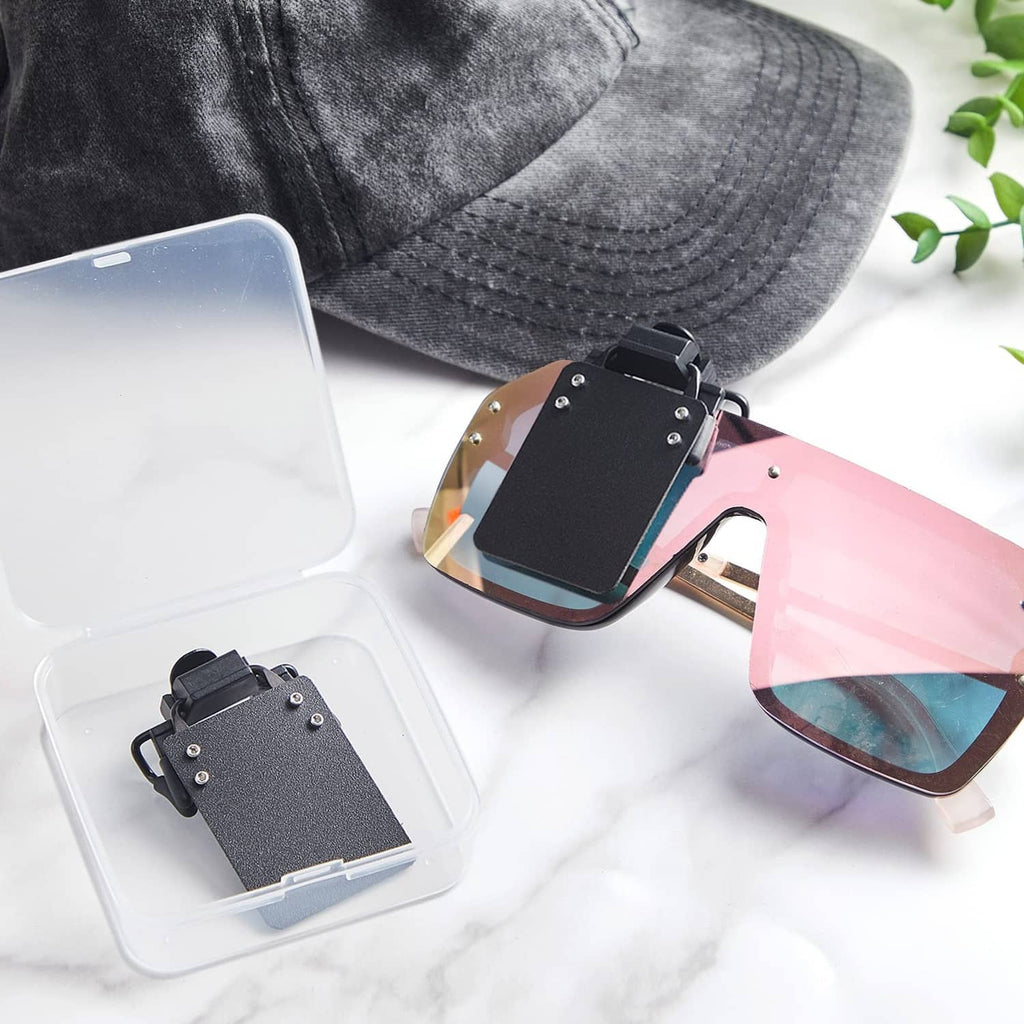 Black clip-on shooting glasses patch with adjustable clip, in clear storage box