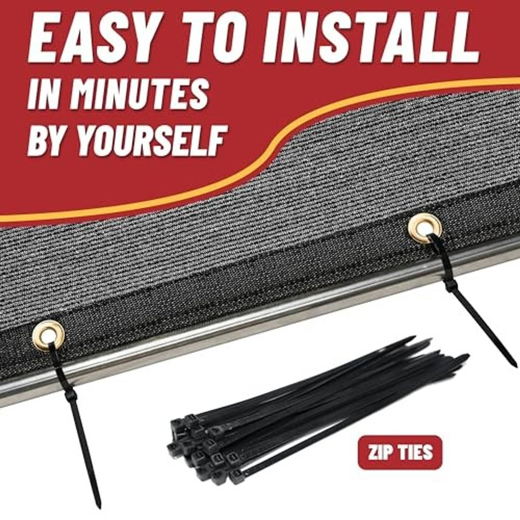 Black shade cloth tarp secured to poles with zip ties and metal grommets