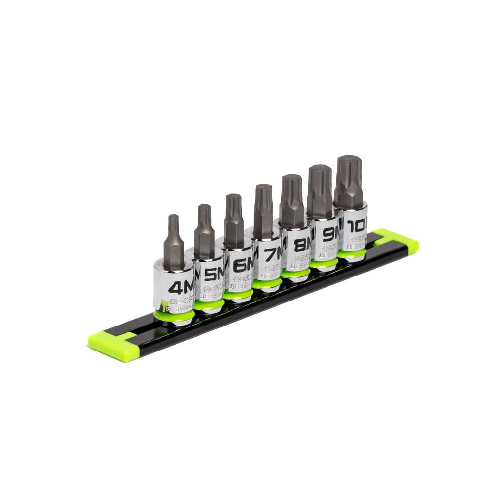 7-piece hex bit socket set on black rail with green accents, angled full set view