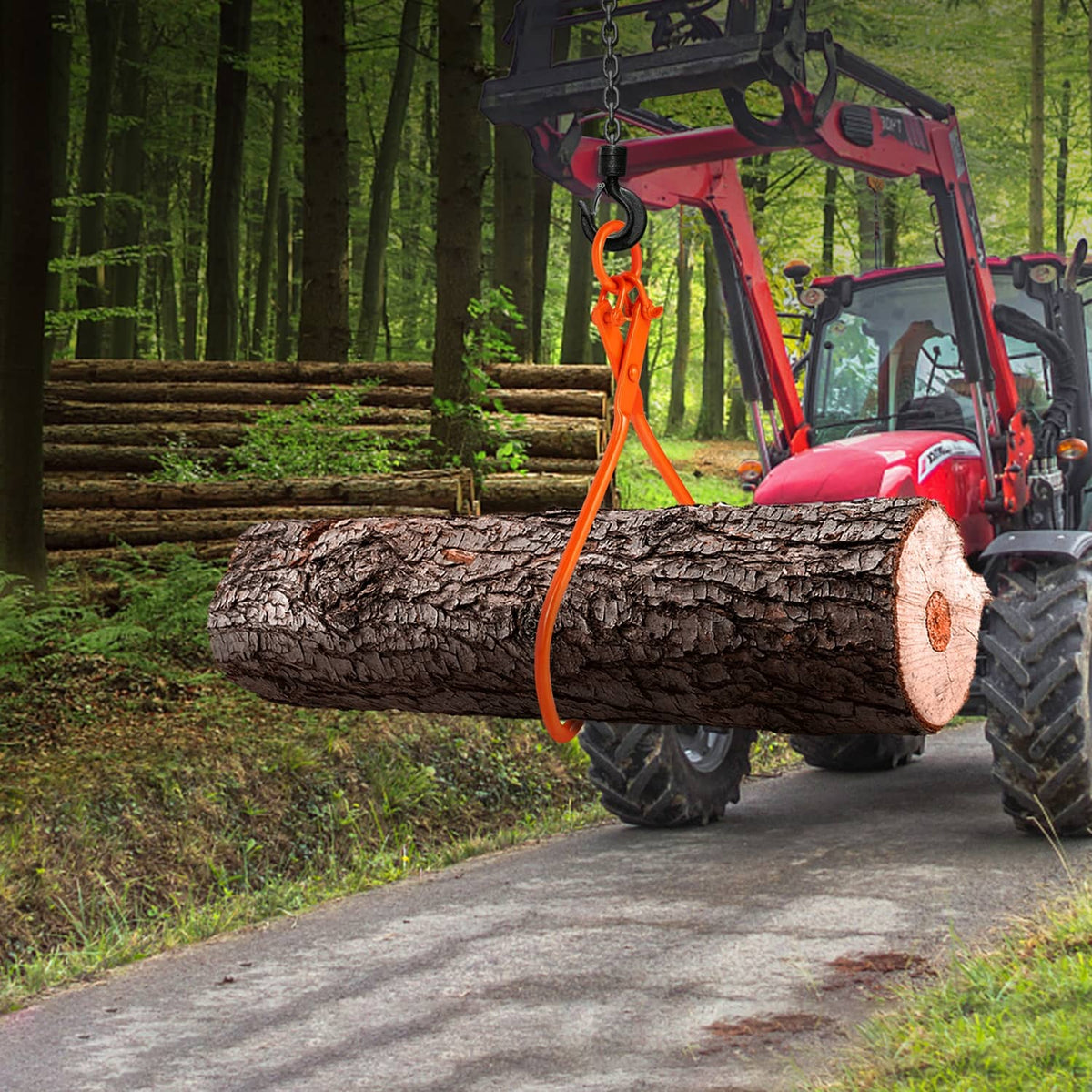 Orange 2-claw log lifting tongs mounted on equipment, holding a large log