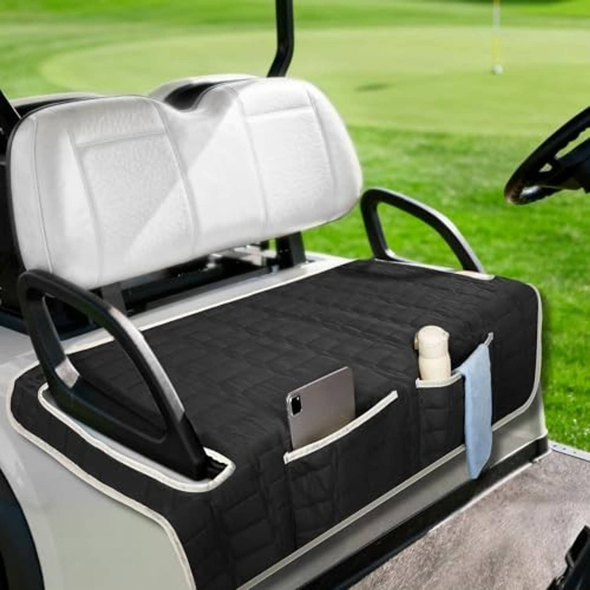Black universal golf cart bench seat cover with quilted padding and storage pockets.