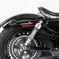 Chrome motorcycle rear shock absorber with coiled spring and mounting eyelet hardware