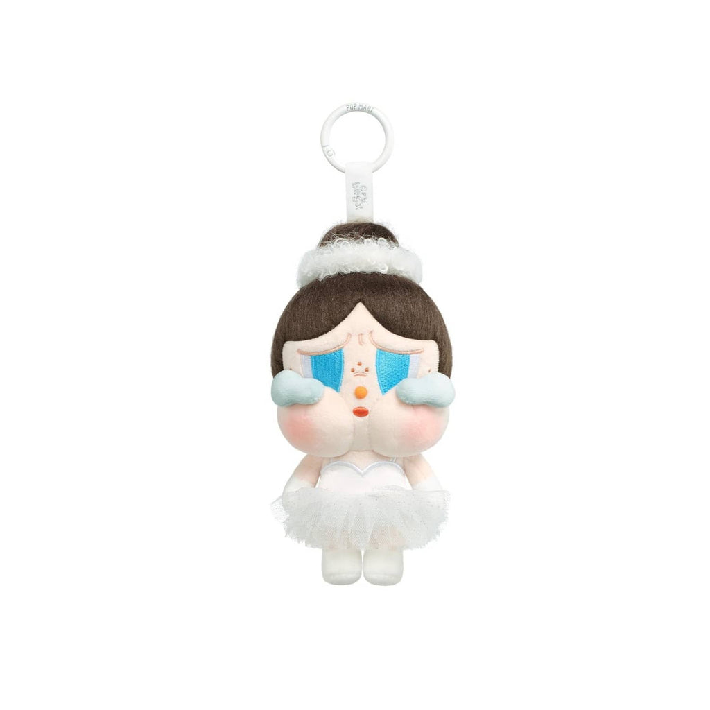 Plush Crybaby keychain pendant with dark hair, blue face details, white tutu skirt