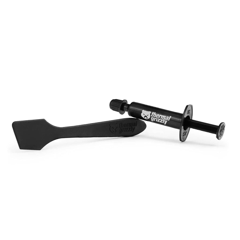 Thermal paste syringe with flat spreader applicator and black nozzle