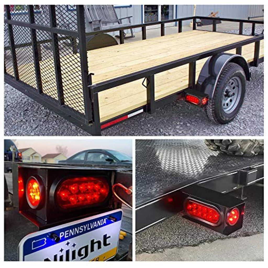 Trailer with black light boxes featuring red oval LED tail lights and red side markers