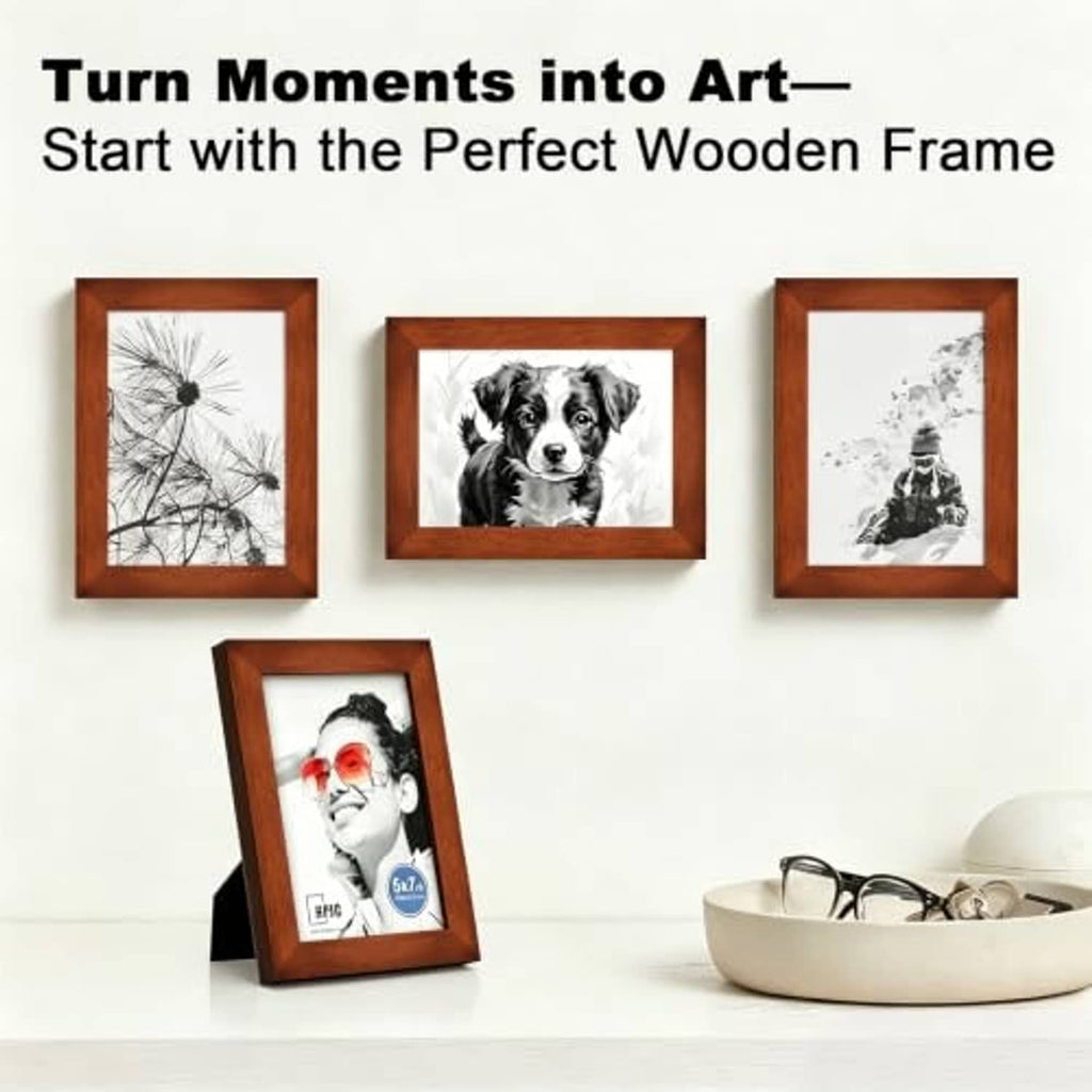 Set of brown wooden picture frames with glass covers arranged on wall