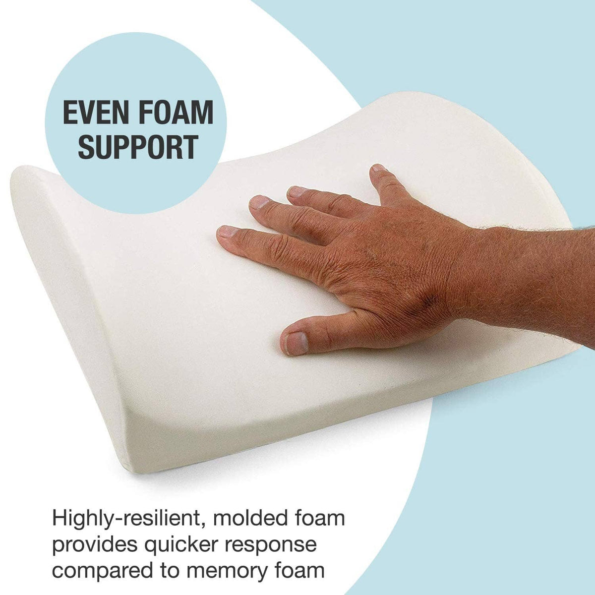 Light beige lumbar support pillow with hand pressing on the foam surface