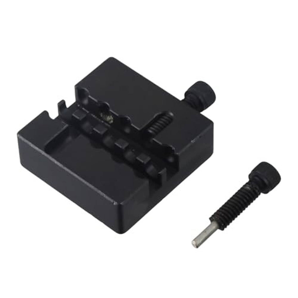 Black motorcycle chain breaker tool with punch screw and mounting knobs
