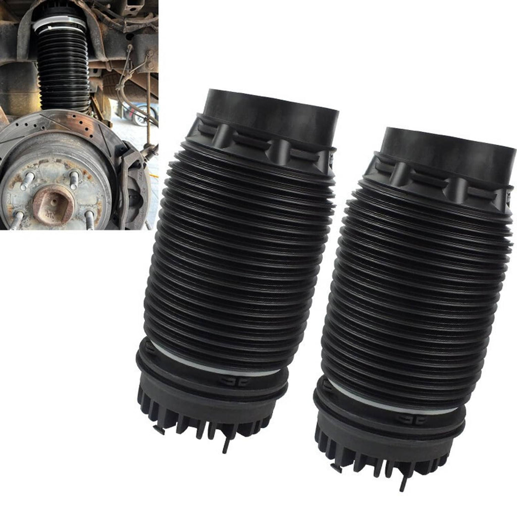 Two black rear air suspension spring bags with studded bases and ribbed bellows