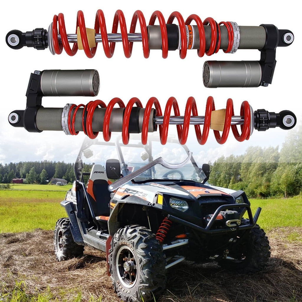Pair of adjustable front UTV shock absorbers with red coil springs and gray dampers