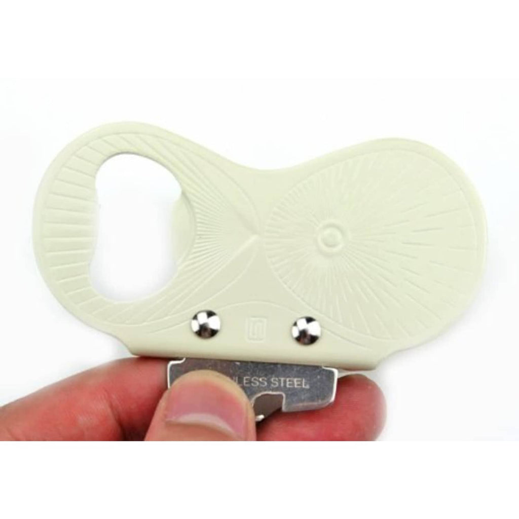 White can opener with stainless steel blade, held between fingers