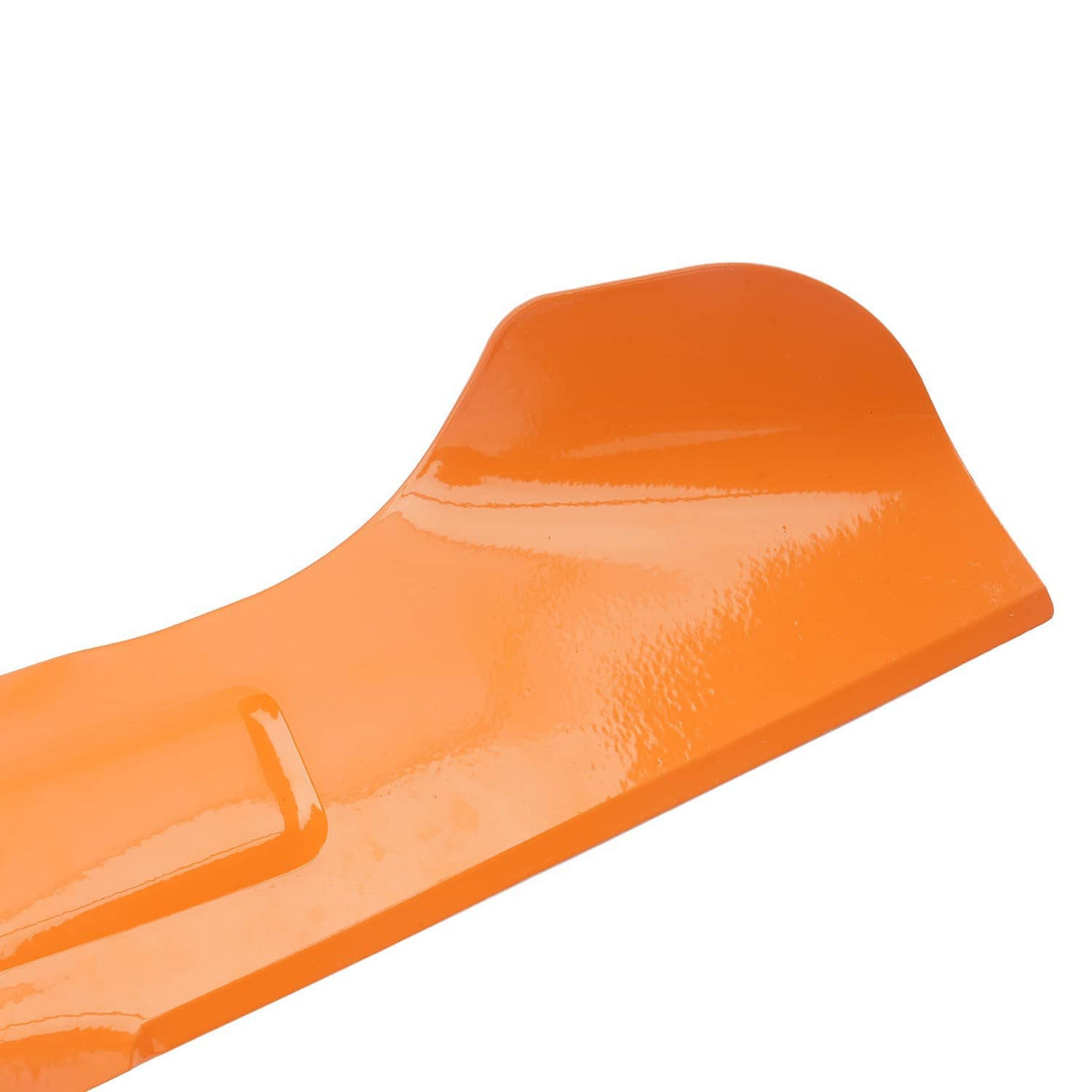 Orange mower blade close-up with glossy finish and curved cutting edge
