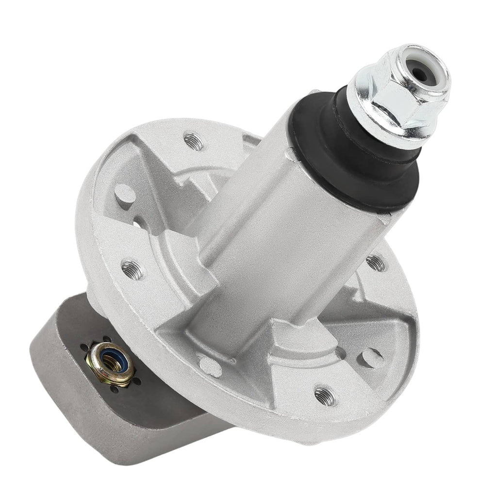 Mower spindle assembly close-up with silver housing, black bushing, and mounting holes.