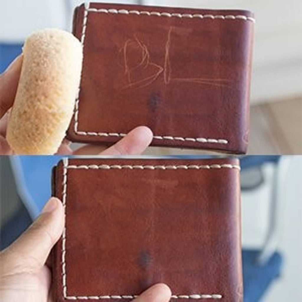 Brown leather wallet with stitched edge and corner surface detail
