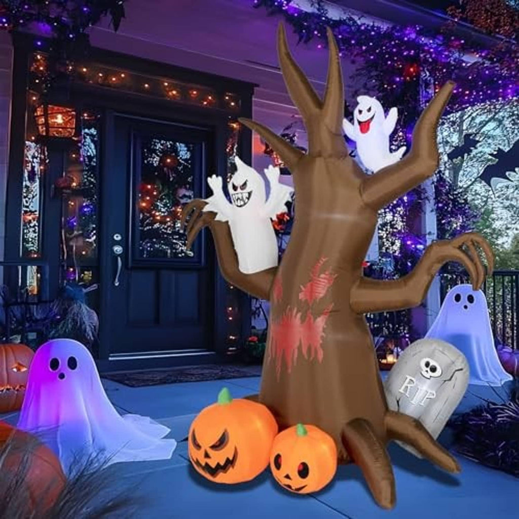 Inflatable Halloween haunted tree decoration with ghosts and glowing jack-o-lanterns in yard