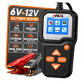 6V/12V car battery tester with digital screen, orange buttons, and red/black clamps