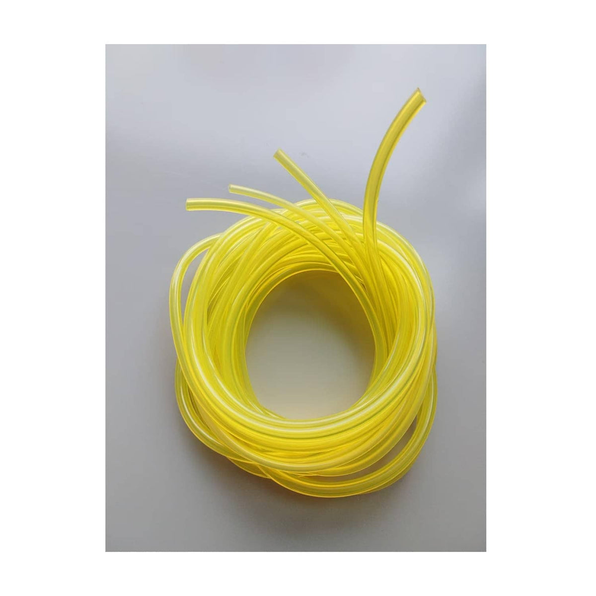 Yellow gas fuel line hose tubing coil with loose cut ends
