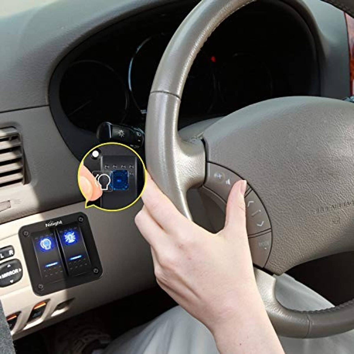 Nilight illuminated rocker switch panel on dashboard with finger pressing