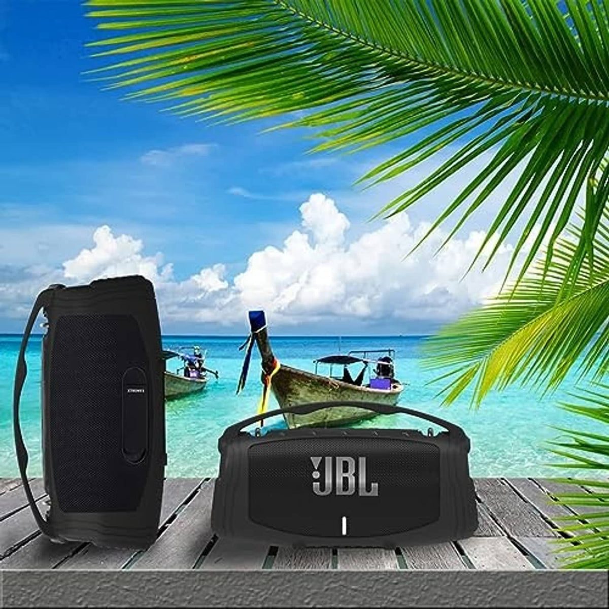 Portable Bluetooth speaker in black silicone cover with JBL logo on front